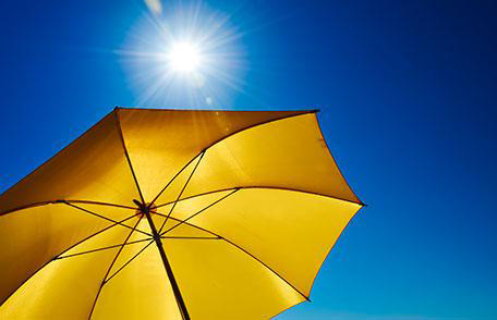 yellow umbrella under sunlight